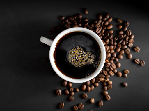 Americano black coffee in a white cup