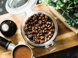 Roasted coffee beans in storage containers