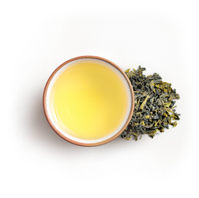 Tea cup with green tea leaves