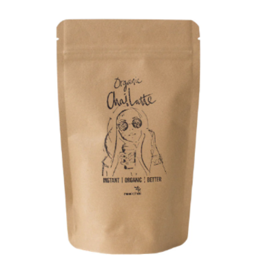 Kraft paper packaging with organic chai latte branding on a white background