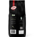 Black coffee bag with Primo Coffee branding on a white background