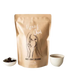Image of real chai honey with cup of latte and loose chai leaves 